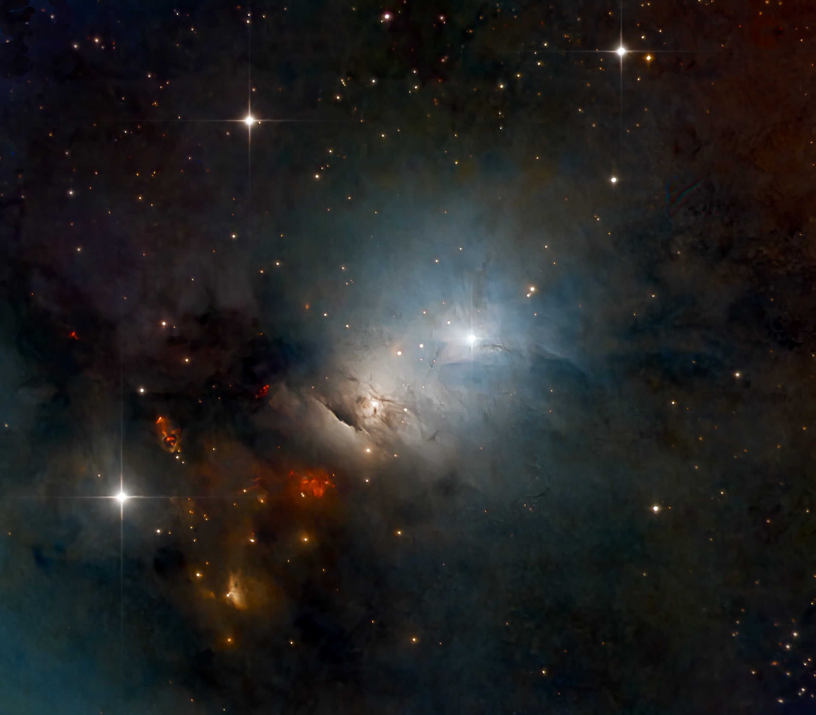 NGC 1333 is seen in visible light as a reflection nebula, dominated by bluish hues characteristic of starlight reflected by interstellar dust. A mere 1,000 light-years distant toward the heroic constellation Perseus, it lies at the edge of a large, star-forming molecular cloud. This telescopic close-up spans about two full moons on the sky or just over 15 light-years at the estimated distance of NGC 1333. It shows details of the dusty region along with telltale hints of contrasty red emission from Herbig-Haro objects, jets and shocked glowing gas emanating from recently formed stars. In fact, NGC 1333 contains hundreds of stars less than a million years old, most still hidden from optical telescopes by the pervasive stardust. The chaotic environment may be similar to one in which our own Sun formed over 4.5 billion years ago.