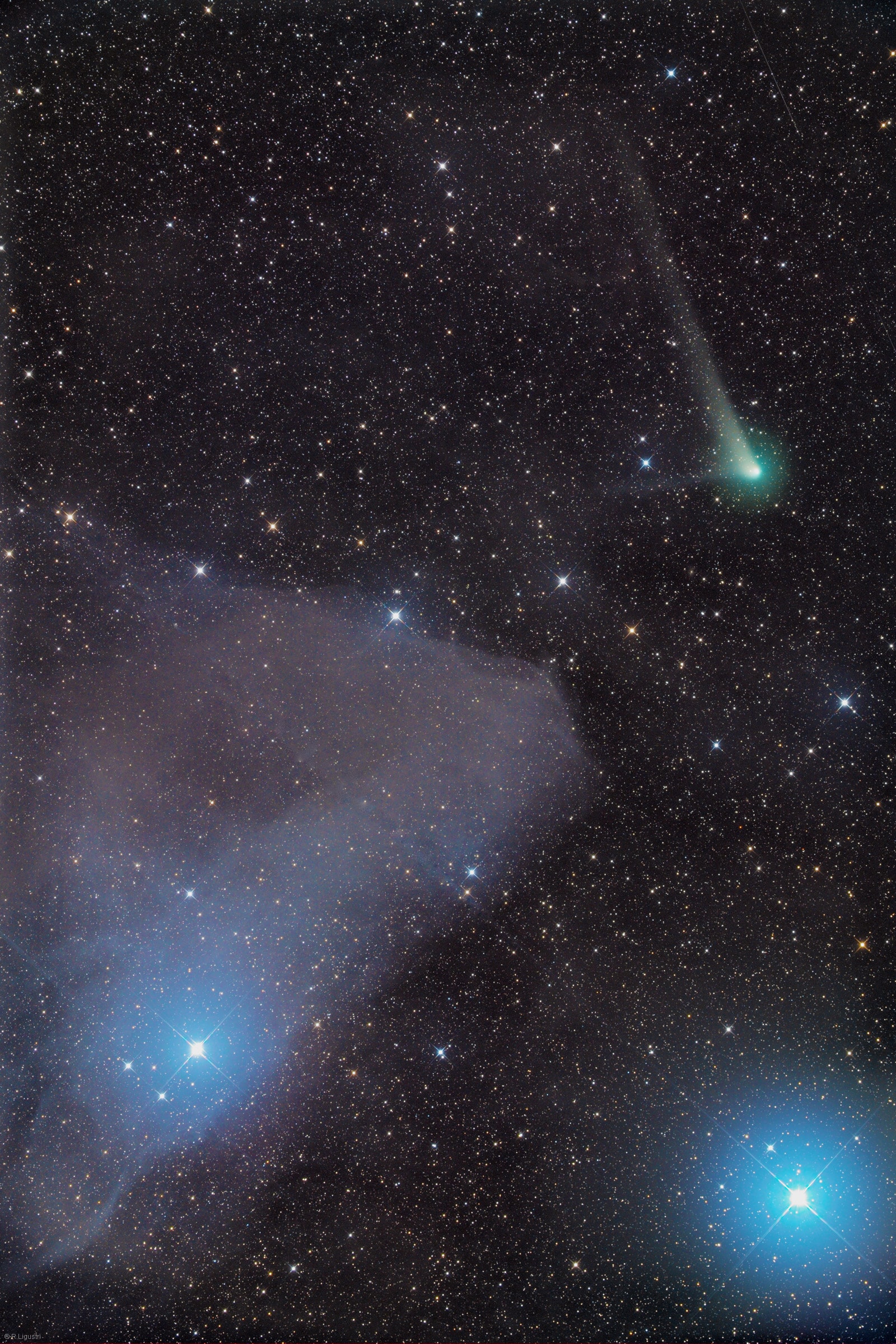Heading for its closest approach to the Sun, or perihelion, on December 19 comet C/2017 K2 (PanSTARRS) remains a sight for telescopic observers as it sweeps through planet Earth's skies in the constellation Scorpius. The comet currently sports a greenish coma, long whitish dust tail, and short ion tail in this deep image from August 18. The 2x3 degree wide field of view includes part of the dusty nebula IC 4592 reflecting blue starlight. Also known as the Blue Horsehead Nebula, IC 4592 is about 400 light-years distant while the comet is just under 17 light-minutes away. First spotted at a distance well beyond the orbit of Saturn C/2017 K2 is on its maiden voyage to the inner solar system, a pristine visitor from the remote Oort cloud.