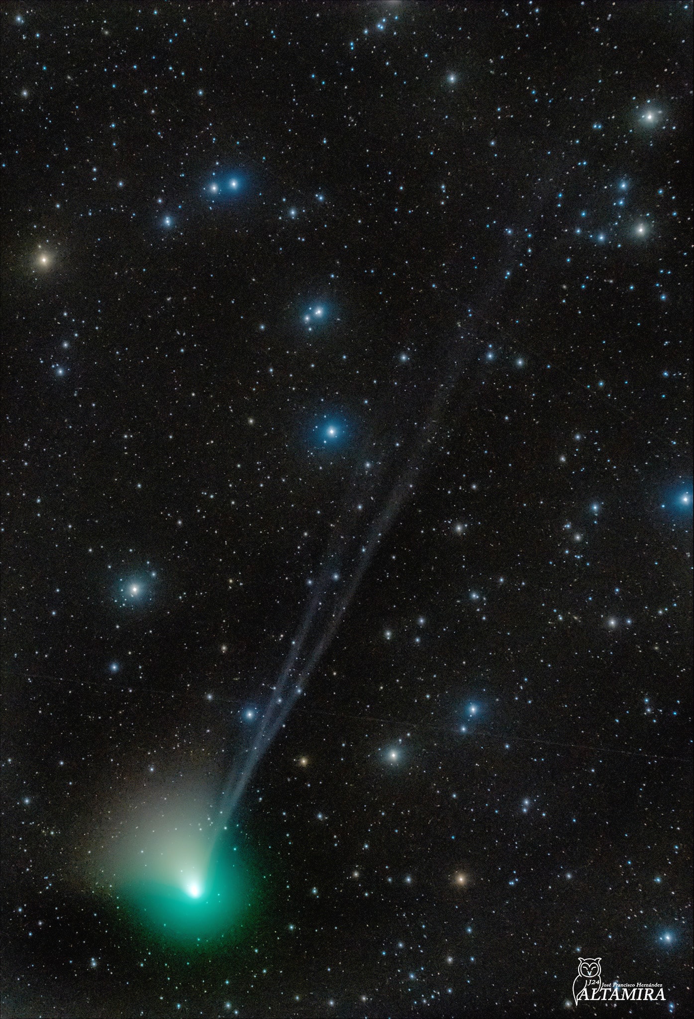 Comet ZTF may become visible to the unaided eye. Discovered early last year, this massive snowball has been brightening as it approaches the Sun and the Earth. C/2022 E3 (ZTF) will be closest to the Sun later this week, at which time it may become visible even without binoculars to northern observers with a clear and dark sky. As they near the Sun, comet brightnesses are notoriously hard to predict, though. In the featured image taken last week in front of a picturesque star field, three blue ion tails extend to the upper right, likely the result of a variable solar wind on ions ejected by the icy comet nucleus. The comet's white dust tail is visible to the upper left and much shorter. The green glow is the comet's coma, caused by glowing carbon gas. Comet ZTF is expected to pass nearest the Earth in early February, after which it should dim dramatically. Discovery + Outreach: Graduate student research position open for APOD