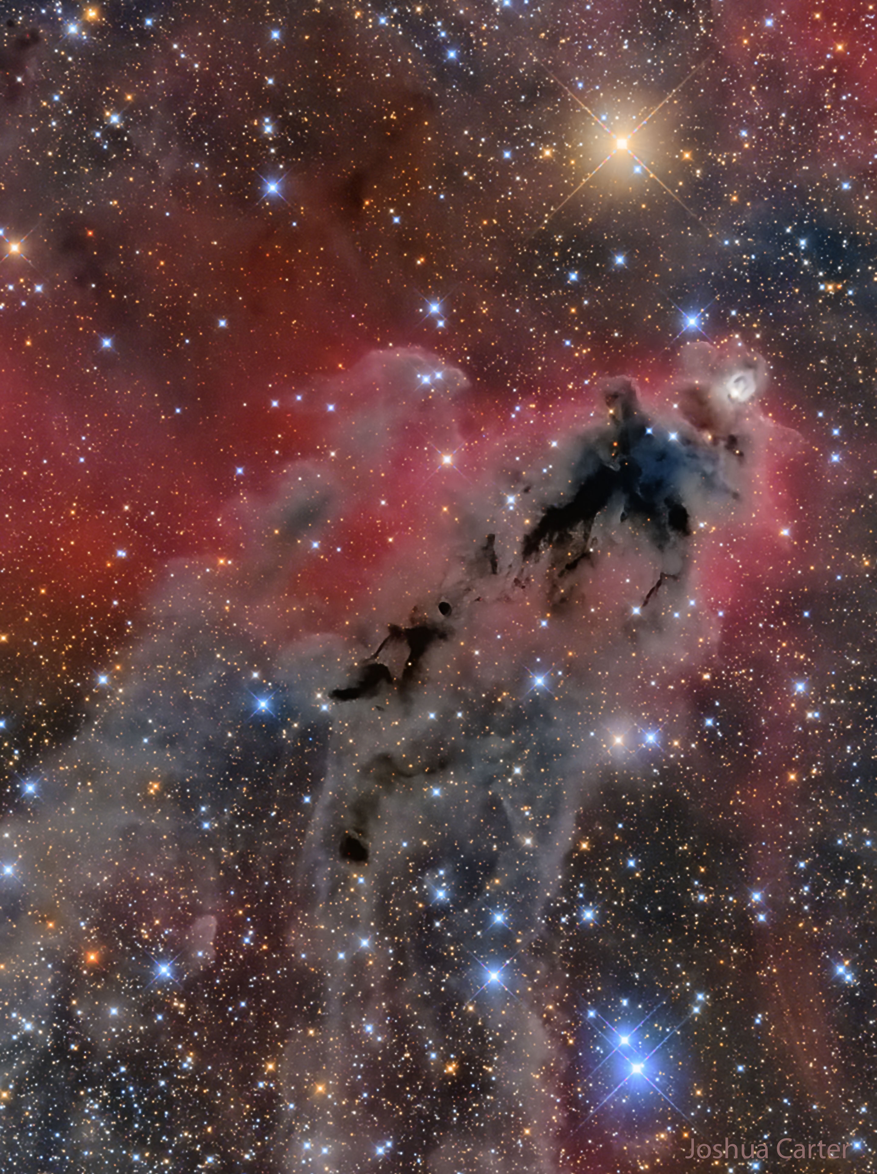 To some, the dark shape looks like a mythical boogeyman. Scientifically, Lynds' Dark Nebula (LDN) 1622 appears against a faint background of glowing hydrogen gas only visible in long telescopic exposures of the region. In contrast, the brighter reflection nebula vdB 62 is more easily seen just above and to the right of center in the featured image. LDN 1622 lies near the plane of our Milky Way Galaxy, close on the sky to Barnard's Loop, a large cloud surrounding the rich complex of emission nebulae found in the Belt and Sword of Orion. With swept-back outlines, the obscuring dust of LDN 1622 is thought to lie at a similar distance, perhaps 1,500 light-years away. At that distance, this 2-degree wide field of view would span about 60 light-years. Young stars do lie hidden within the dark expanse and have been revealed in Spitzer Space Telescope infrared images.