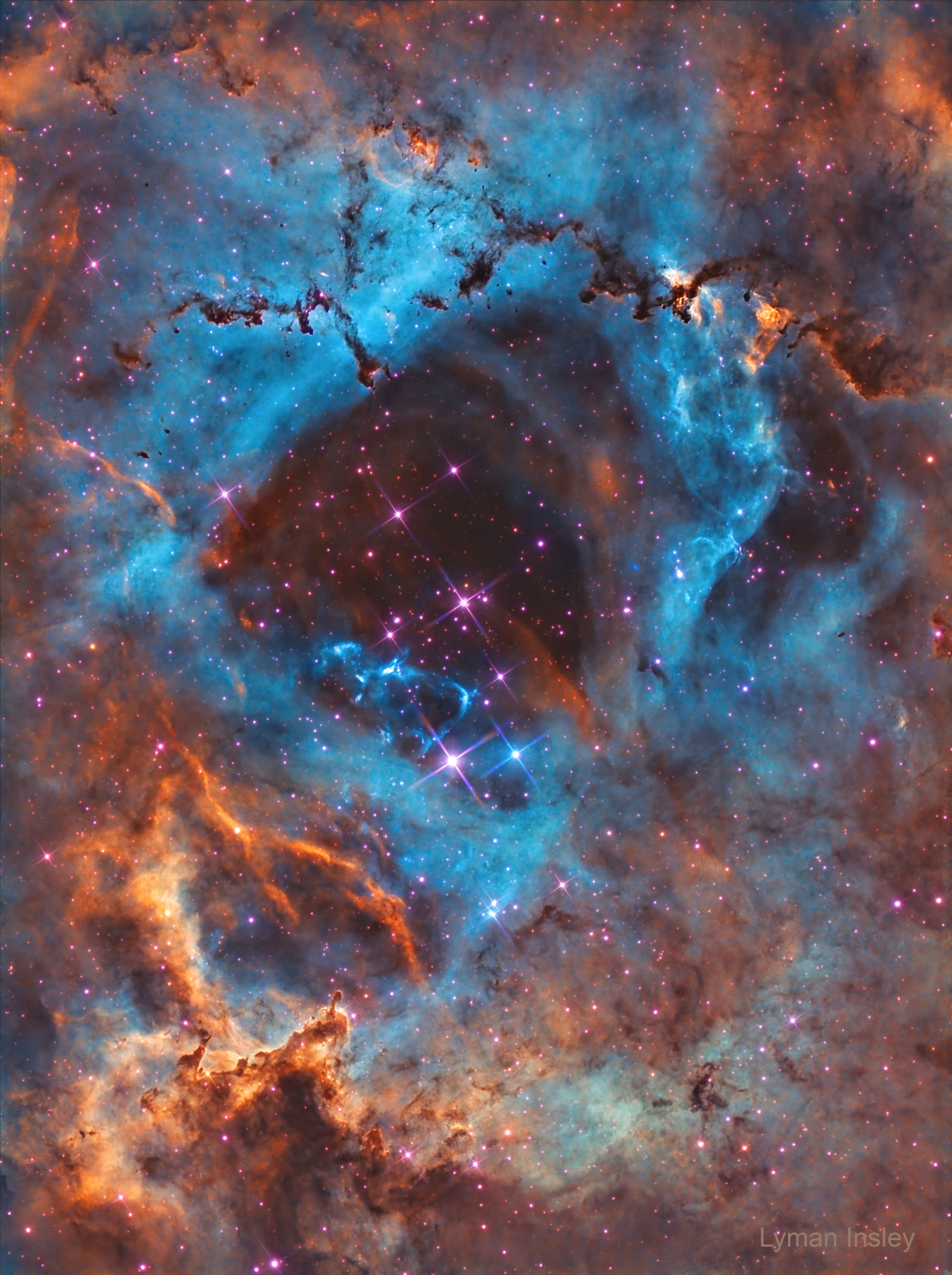 In the heart of the Rosette Nebula lies a bright cluster of stars that lights up the nebula. The stars of NGC 2244 formed from the surrounding gas only a few million years ago. The featured image taken in mid-January using multiple exposures and very specific colors of Sulfur (shaded red), Hydrogen (green), and Oxygen (blue), captures the central region in tremendous detail. A hot wind of particles streams away from the cluster stars and contributes to an already complex menagerie of gas and dust filaments while slowly evacuating the cluster center. The Rosette Nebula's center measures about 50 light-years across, lies about 5,200 light-years away, and is visible with binoculars towards the constellation of the Unicorn (Monoceros). Your Sky Surprise: What picture did APOD feature on your birthday? (post 1995)