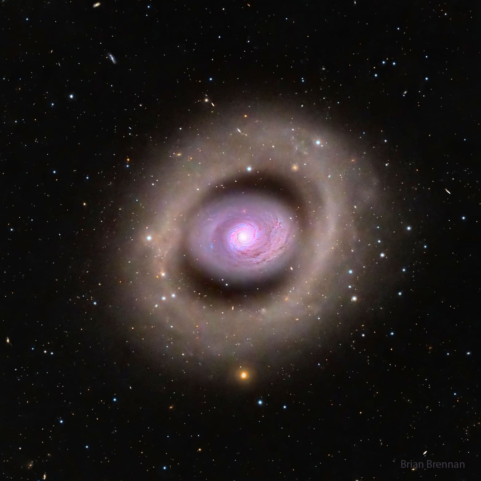 Most galaxies don't have any rings of stars and gas -- why does M94 have two? First, spiral galaxy M94 has an inner ring of newly formed stars surrounding its nucleus, giving it not only an unusual appearance but also a strong interior glow. A leading origin hypothesis holds that an elongated knot of stars known as a bar rotates in M94 and has generated a burst of star formation in this inner ring. Observations have also revealed another ring, an outer ring, one that is more faint, different in color, not closed, and relatively complex. What caused this outer ring is currently unknown. M94, pictured here, spans about 45,000 light years in total, lies about 15 million light years away, and can be seen with a small telescope toward the constellation of the Hunting Dogs (Canes Venatici). More Availability: APOD now accessible via Flipboard.