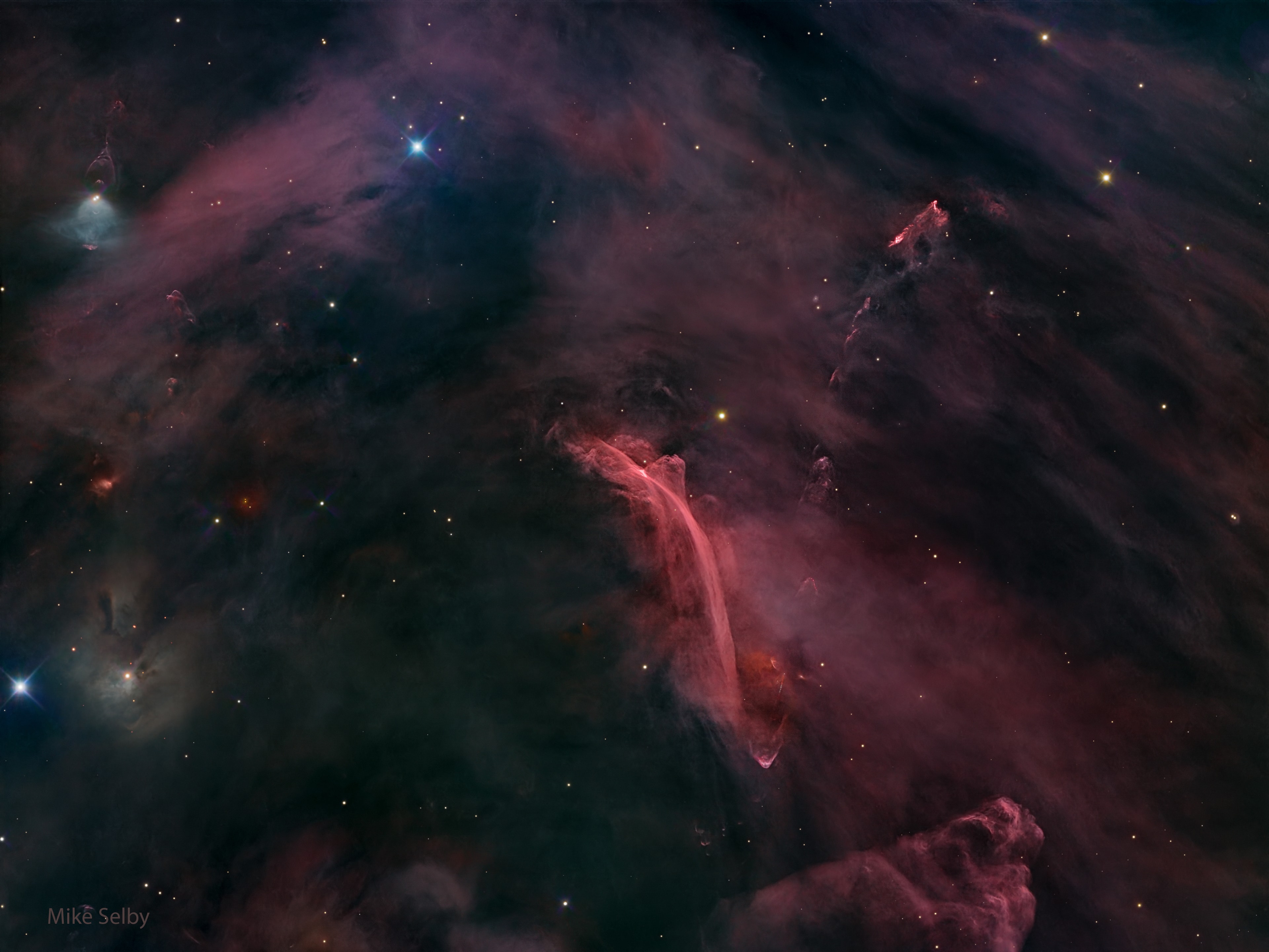 What created the Waterfall Nebula? The origin is still being researched. The structure, officially designated Herbig-Haro 222, appears in the region of NGC 1999 in the Great Orion Molecular Cloud complex. The elongated gaseous stream stretches about ten light years but appears similar to a long waterfall on Earth. Recent observations indicate that HH-222 is likely a gigantic gaseous bow shock, similar to a wave of water caused by a fast-moving ship. The origin of this shock wave is thought to be a jet outflow from the multiple star system V380 Orionis off the lower left of the frame. Therefore, gas does not flow along the waterfall, but rather the entire structure moves toward the upper right. The Waterfall Nebula lies about 1,500 light years away toward the constellation of Orion. The featured image was captured earlier this month from El Sauce Observatory in Chile. Jigsaw Nebula: Astronomy Puzzle of the Day