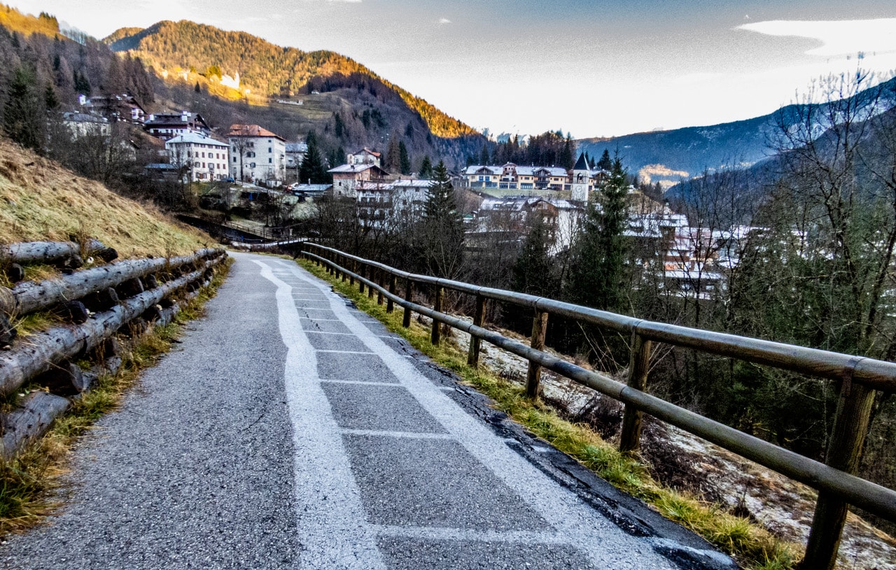 The word solstice is from the Latin for Sun and to pause or stand still. And in the days surrounding a solstice the Sun's annual north-south drift in planet Earth's sky does slow down, pause, and then reverse direction. So near the solstice the daily path of the Sun through the sky really doesn't change much. In fact, near the December solstice, the Sun's consistent, low arc through northern hemisphere skies, along with low surface temperatures, has left a noticeable imprint on this path to the mountain town of Peaio in northern Italy. The morning frost on the road has melted away only where the sunlight was able to reach the ground. But it remains in the areas persistently shadowed by the fence, tattooing in frost an image of the fence on the asphalt surface.