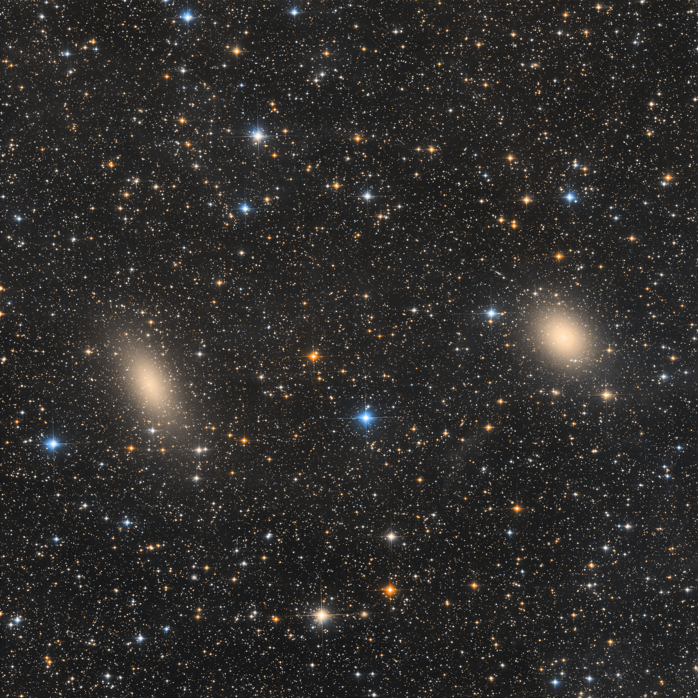 Dwarf galaxies NGC 147 (left) and NGC 185 stand side by side in this deep telescopic portrait. The two are not-often-imaged satellite galaxies of M31, the great spiral Andromeda Galaxy, some 2.5 million light-years away. Their separation on the sky, less than one degree across a pretty field of view toward the constellation Cassiopeia, translates to only about 35 thousand light-years at Andromeda's distance, but Andromeda itself is found well outside this frame. Brighter and more famous satellite galaxies of Andromeda, M32 and M110, are seen much closer to the great spiral. NGC 147 and NGC 185 have been identified as binary galaxies, forming a gravitationally stable binary system. But recently discovered faint dwarf galaxy Cassiopeia II also seems to be part of their system, forming a gravitationally bound group within Andromeda's intriguing population of small satellite galaxies.