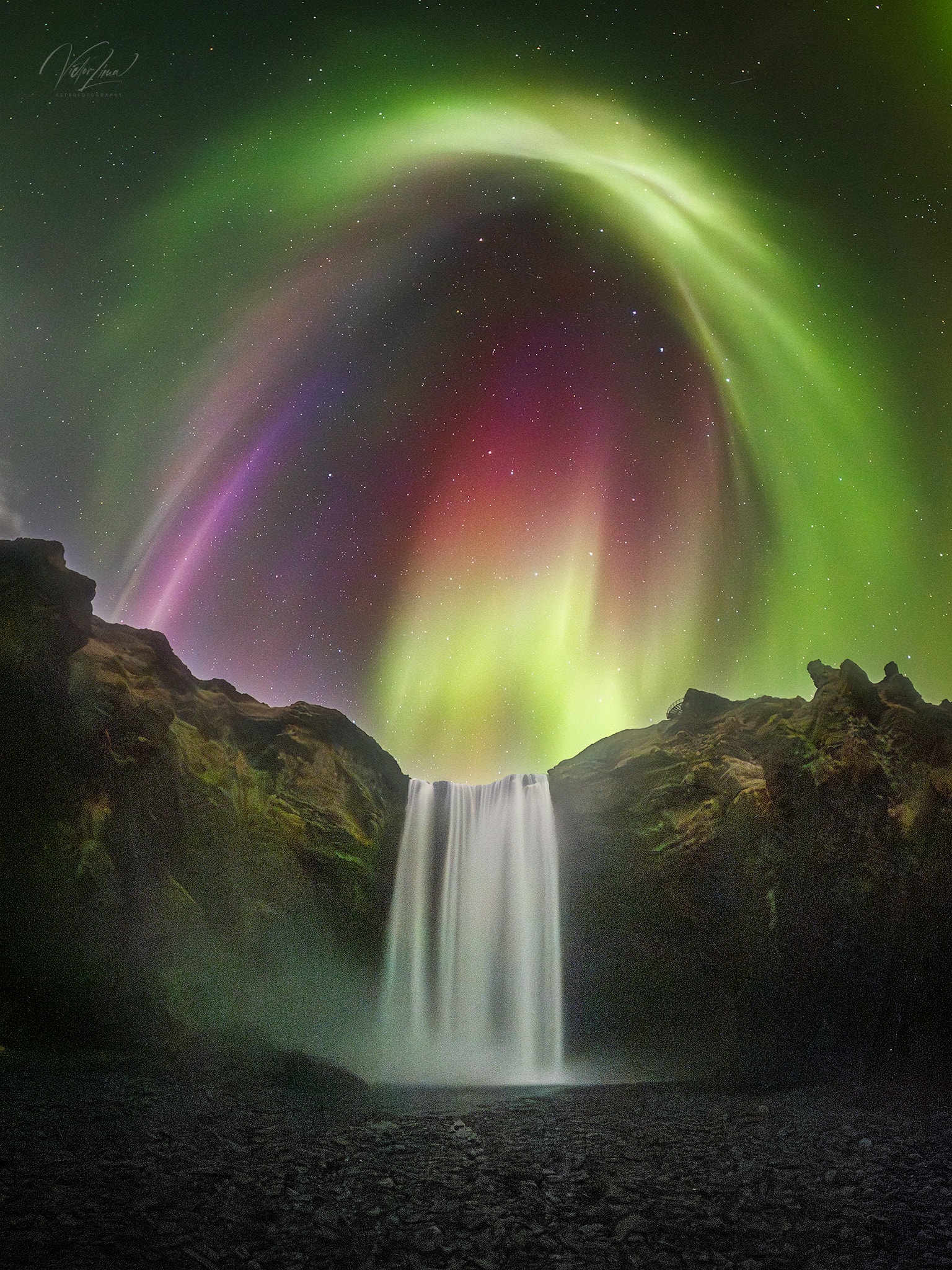 What a sight to behold, when a night sky became filled with colors that appeared to rain over the Skógafoss waterfall in Iceland. This image was taken in a single 5 second exposure by the photographer in April 2025. Seeing an aurora is on many people's bucket lists. But it is not easy. It requires high solar activity, dark and clear skies, and usually a viewing location at high latitude. That makes the northern lights more easily seen than the corresponding southern lights, simply because there is less landmass in the Southern Hemisphere, especially around the Antarctic Circle. Auroras are caused by charged particles from the solar wind that are captured by the Earth's magnetosphere and guided by the magnetic field to a region close to one of the poles, where they collide with gas particles in the atmosphere. Different colors indicate interactions with different gases at different altitudes, like oxygen (red and green) and nitrogen (blue and pink). APOD's main NASA site is moving : From apod.nasa.gov to science.nasa.gov/apod