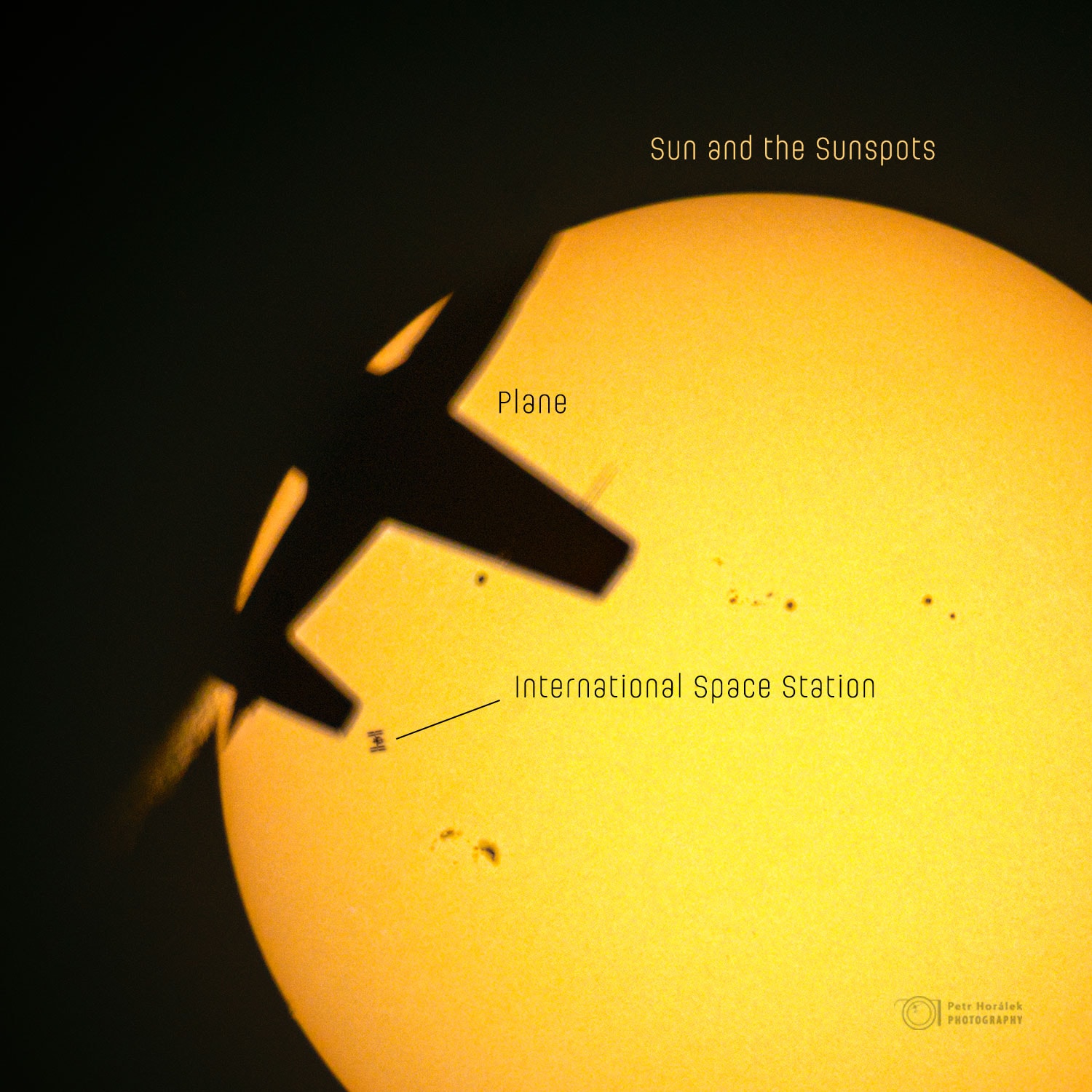 This shot captured an unexpected silhouette. Which is it? It isn't the sunspots, the small dark regions caused by concentrated magnetic fields visible around the Sun's bright disk. Sunspots typically last for weeks and were expected, since these spots were seen previously. It isn’t the International Space Station (ISS), the small dark structure on the middle left. This is because the featured picture was planned with sub-second timing to record the iconic structure passing before the Sun. It is the airplane. Just as this exposure was taking place in June, from Prasek in the Czech Republic, an airplane began its own miniature partial eclipse. The result is this triply aligned image of our Sun. The photographer estimates that the chance of any random Sun image containing silhouettes of both a space station and an airplane, from that location, is about 30 million to one. APOD's main NASA site is moving: From apod.nasa.gov to science.nasa.gov/apod